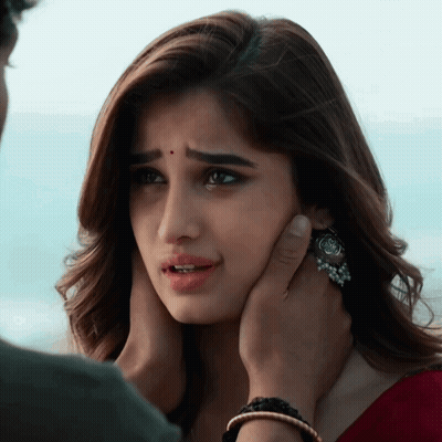 Man Touching Woman's Face GIF