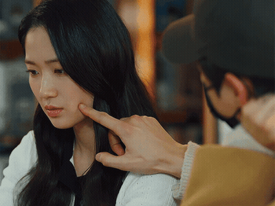 Man Touching Woman's Face While Wearing Mask GIF