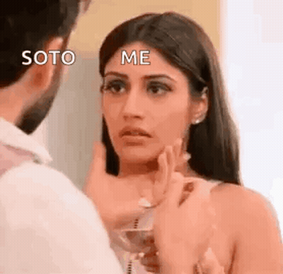 Man Touching Woman's Face GIF