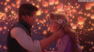 Man Touching Woman's Hair In Tangled GIF