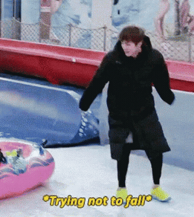Man Trying Not To Fall On Snow GIF