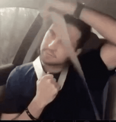 Man Tying Seat Belt In Car GIF