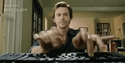 Man Typing On Keyboard With Hands Outstretched GIF