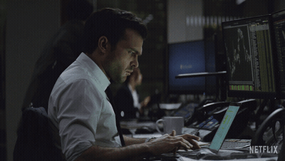 Man Typing On Laptop With Netflix Logo GIF