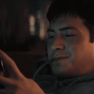 Man Using Cell Phone GIF