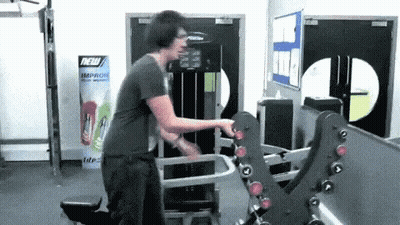 Man Using Gym Machine By Sign Saying New Improve Your Work GIF