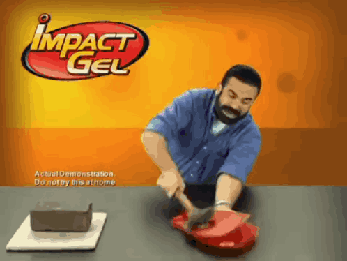 Man Using Hammer On Red Impact Gel GIF