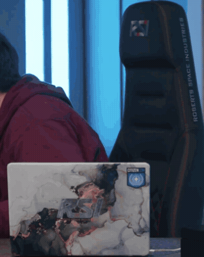Man Using Laptop Behind Roberts Space Industries Chair GIF