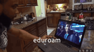 Man Using Laptop With Eduroam GIF