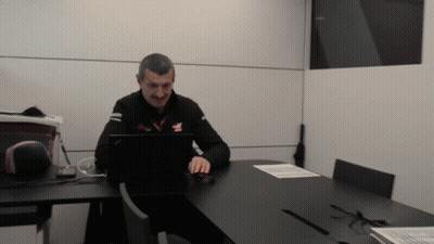 Man Using Laptop With Haas Shirt GIF