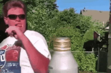 Man Using Mullet Hair As Bottle Opener GIF