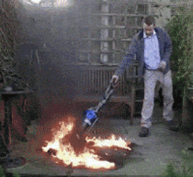 Man Vacuumed A Small Fire Tornado GIF