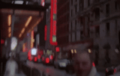 Man Walking City Street GIF