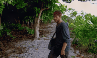 Man Walking Down Dirt Path With BBC GIF