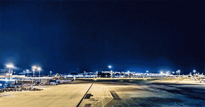 Man Walking Down Escalator Exit Sign GIF