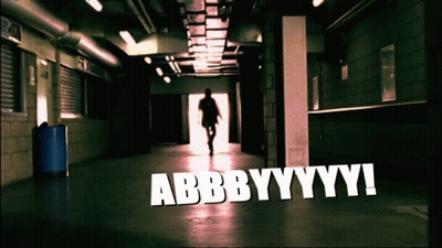 Man Walking Down Hallway With Abbbbyyyy GIF