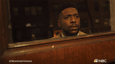 Man Walking Down Hallway With NBC Logo GIF