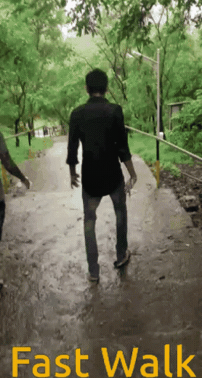 Man Walking Down Path Fast Walk GIF