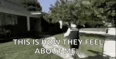 Man Walking Down Sidewalk GIF