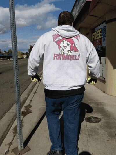 Man Walking Down Sidewalk In For Bama Billy Hoodie GIF