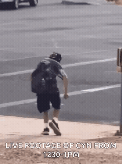 Man Walking Down Sidewalk GIF