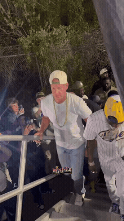 Man Walking Down Stairs With Wave Check GIF