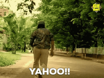 Man Walking Down Street With Yahoo GIF