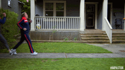 Man Walking Fast Trying To Outrun Woman GIF