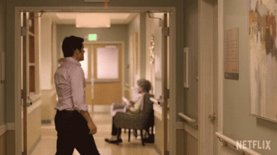 Man Walking Hospital Hallway Netflix Sign GIF