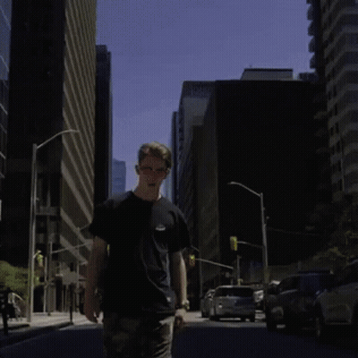 Man Walking In Front Of Matches Wall GIF