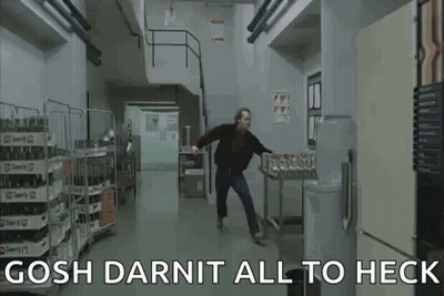 Man Walking In Kitchen Hallway GIF