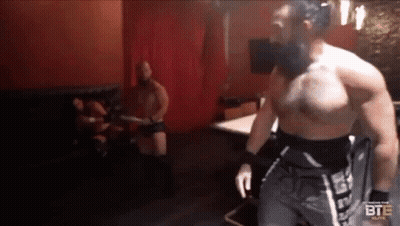 Man Walking In Wrestling Match GIF