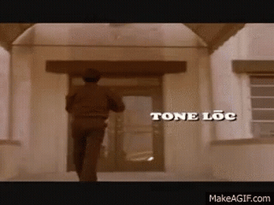Man Walking Into Tone Loc Building GIF