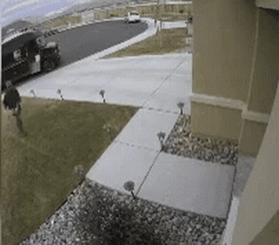 Man Walking Next To Delivery Truck GIF