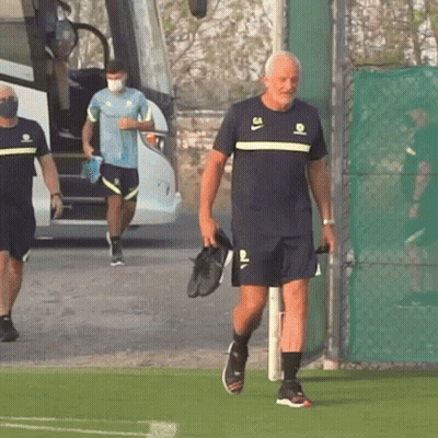 Man Walking On Field In Number 64 Shirt GIF