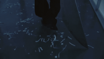 Man Walking Past No Exit Sign GIF