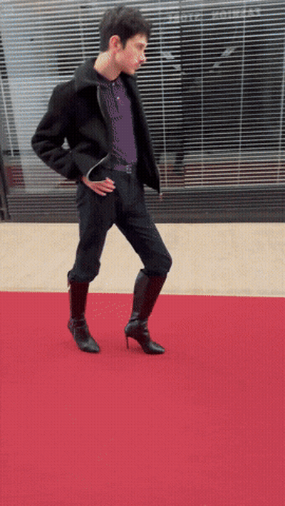 Man Walking Red Carpet In High Heels GIF