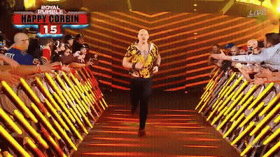 Man Walking Through Tunnel With Happy Corbin Sign GIF