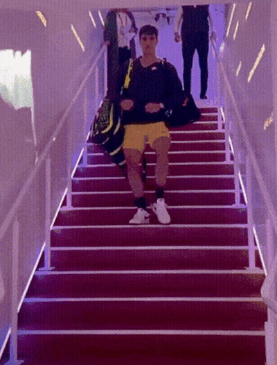 Man Walking Up Stairs With Nike Bag GIF