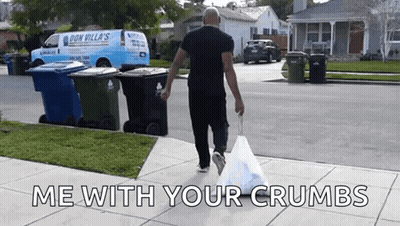 Man Walking With Bag Of Garbage GIF