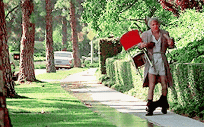 Man Walking With Red Flag GIF