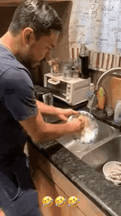 Man Washing Dishes In Kitchen Sink GIF