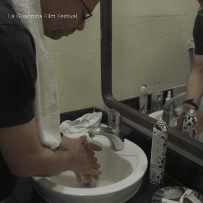 Man Washing Hands At Sink La Guarimba Film Festival GIF
