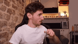 Man Watching Drink Water To Feel Relieve GIF