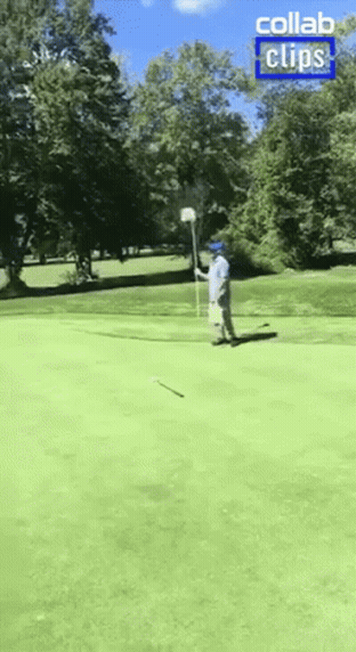Man Watching Girl Throw Frisbee GIF