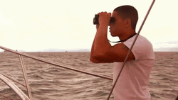 Man Watching The Sea With Binoculars GIF