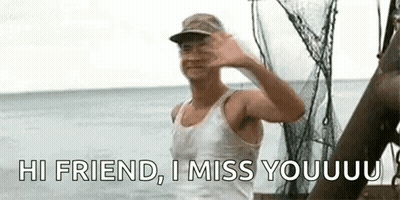 Man Waving On Boat In Ocean GIF
