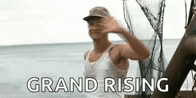 Man Waving On Boat In Ocean GIF