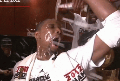 Man Wearing 2012 Champion Shirt GIF