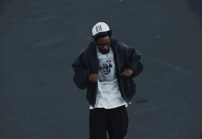 Man Wearing Baby T-Shirt And Black Jacket GIF